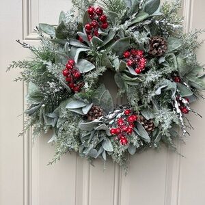 Festive Holiday Wreath with Red Berries and Pinecones